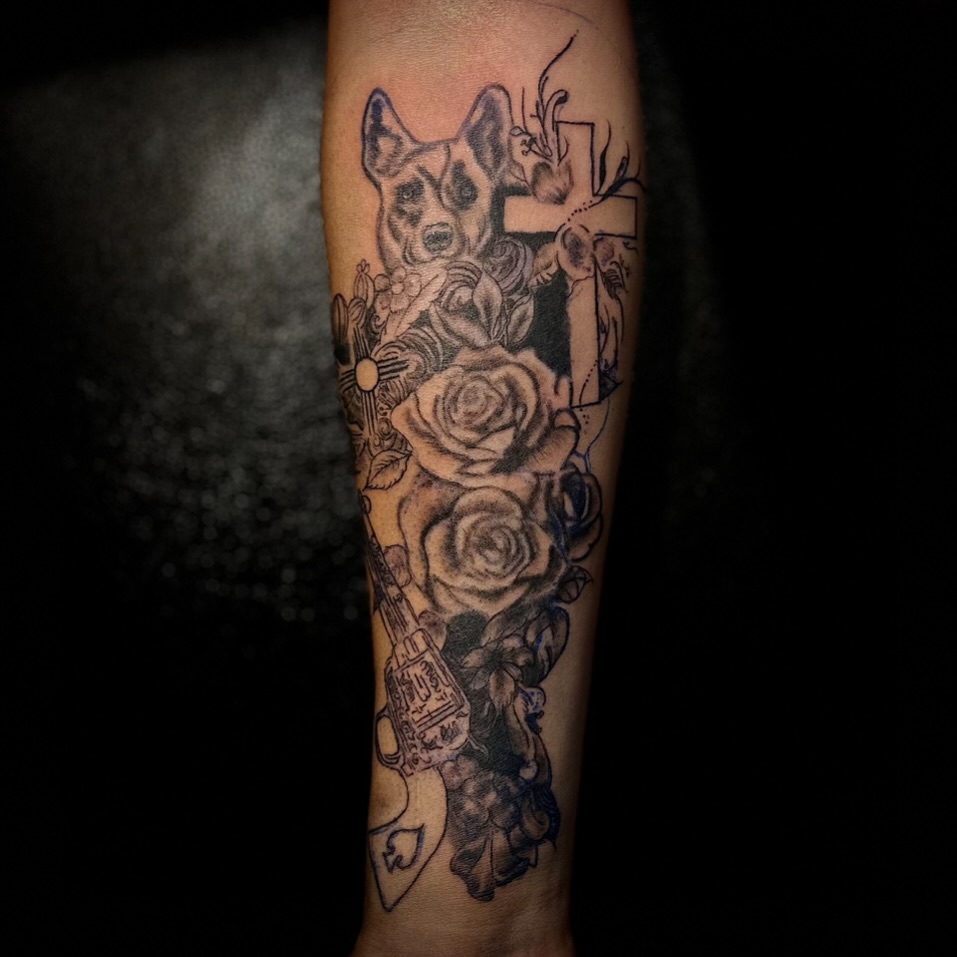 Dog and roses realism tattoo on the forearm by Ink’d by Reina 🖤, Colorado Springs, Colorado