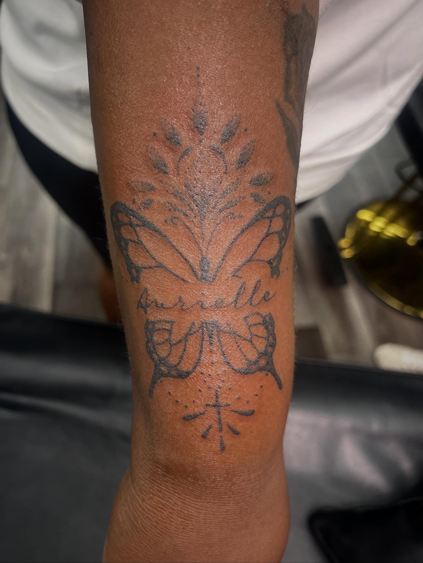 Butterfly dotwork tattoo on the forearm by Monii Arreola