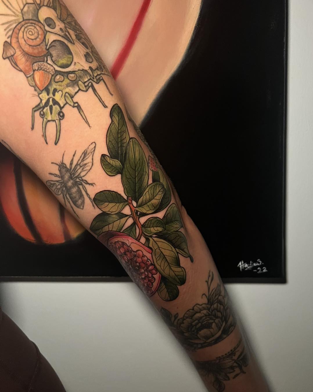 Botanical and insect American traditional tattoo on the forearm by Haylie Adele Strong