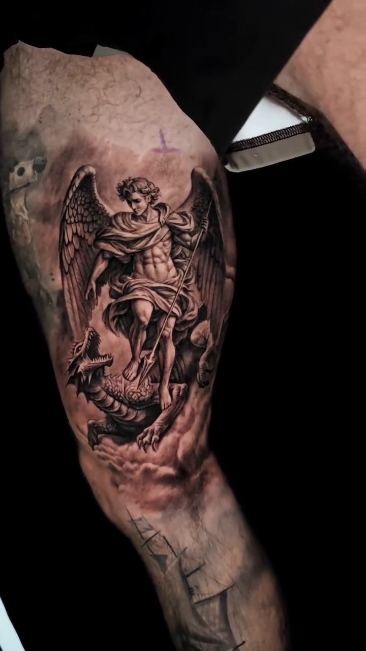 Archangel Michael battling a dragon realism tattoo by Cipri Suciu