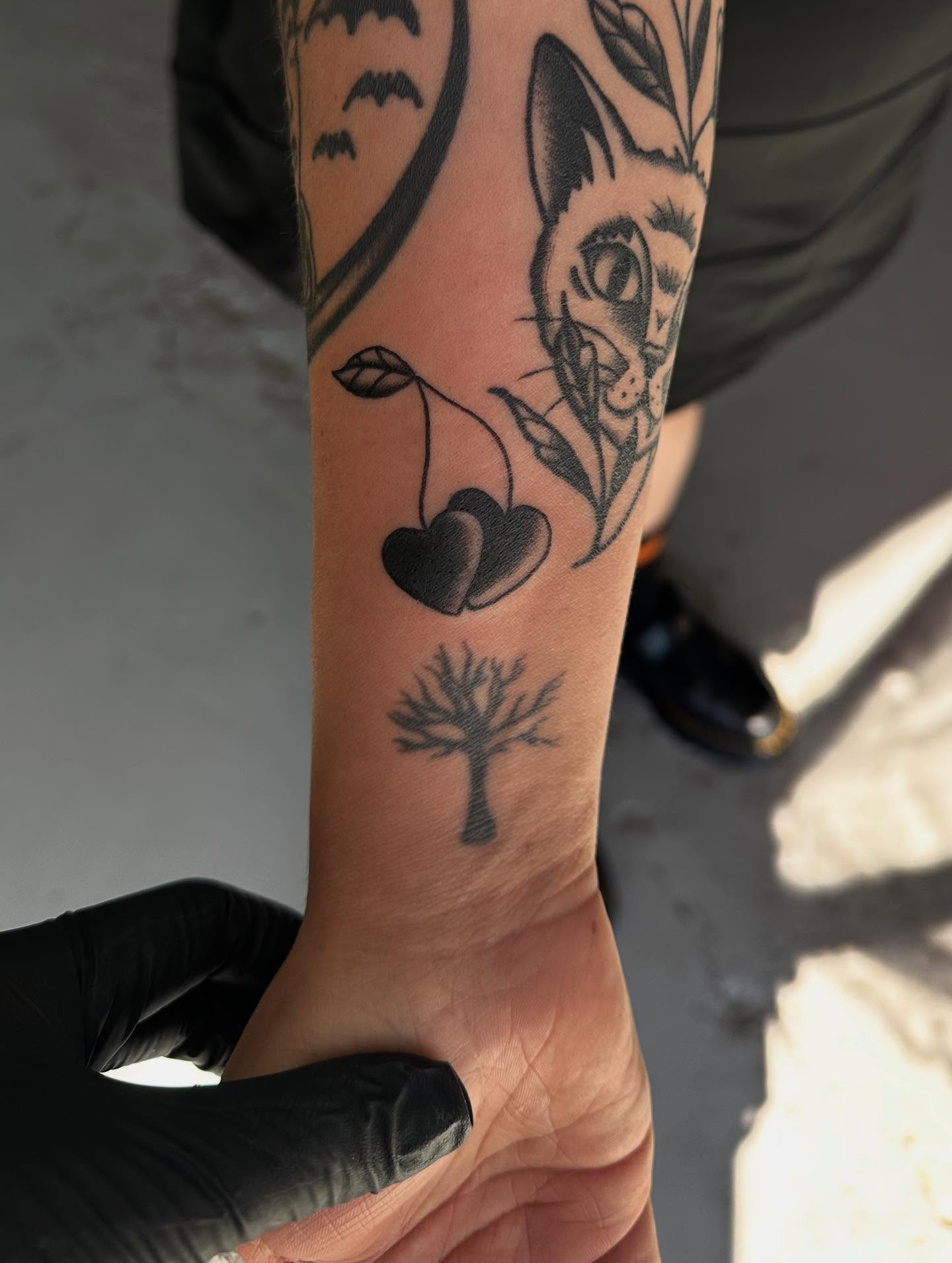 Fox and cherries realism tattoo on the forearm by HannaH
