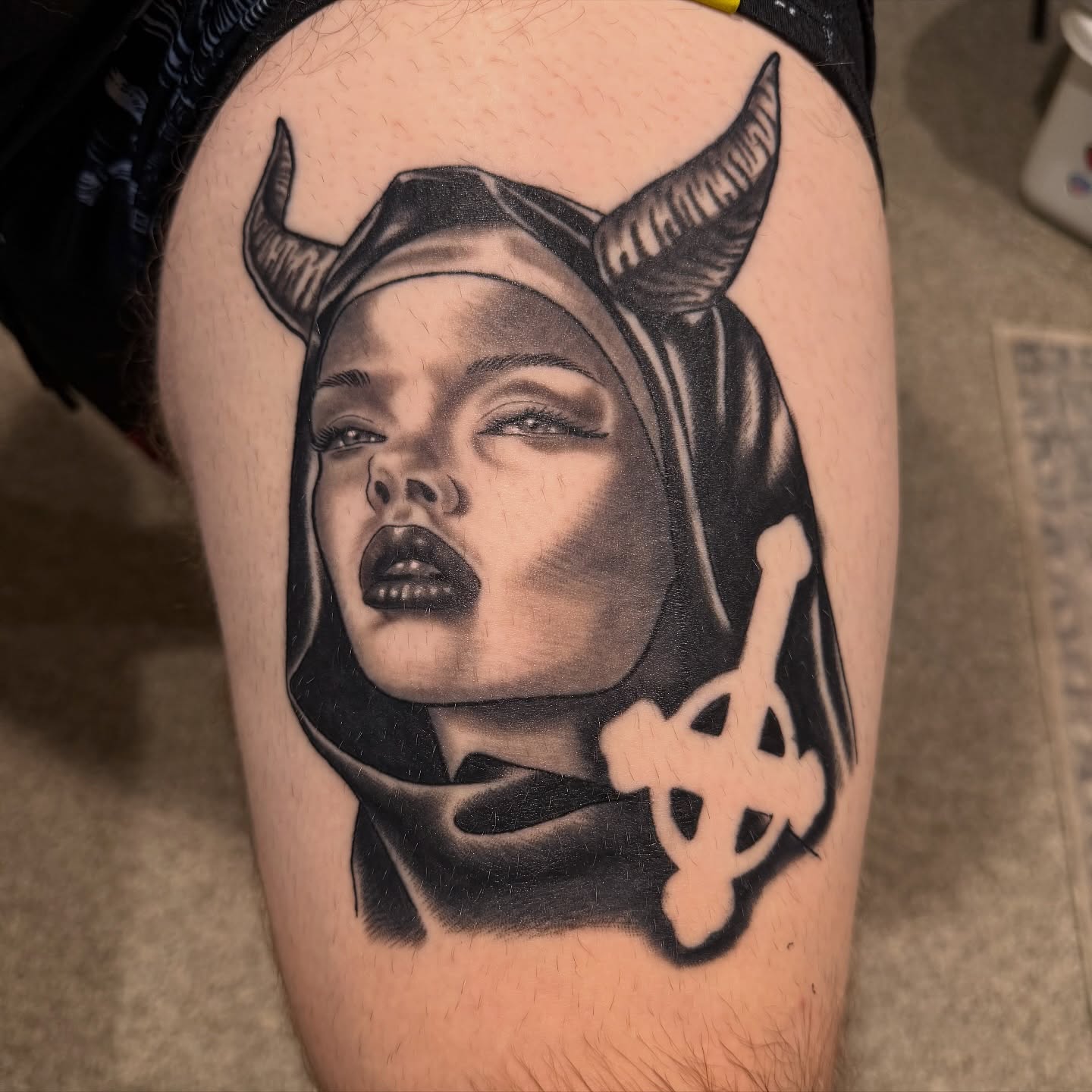 Woman with horns realism tattoo on the thigh by Schyler Ames, Canal Fulton, Ohio