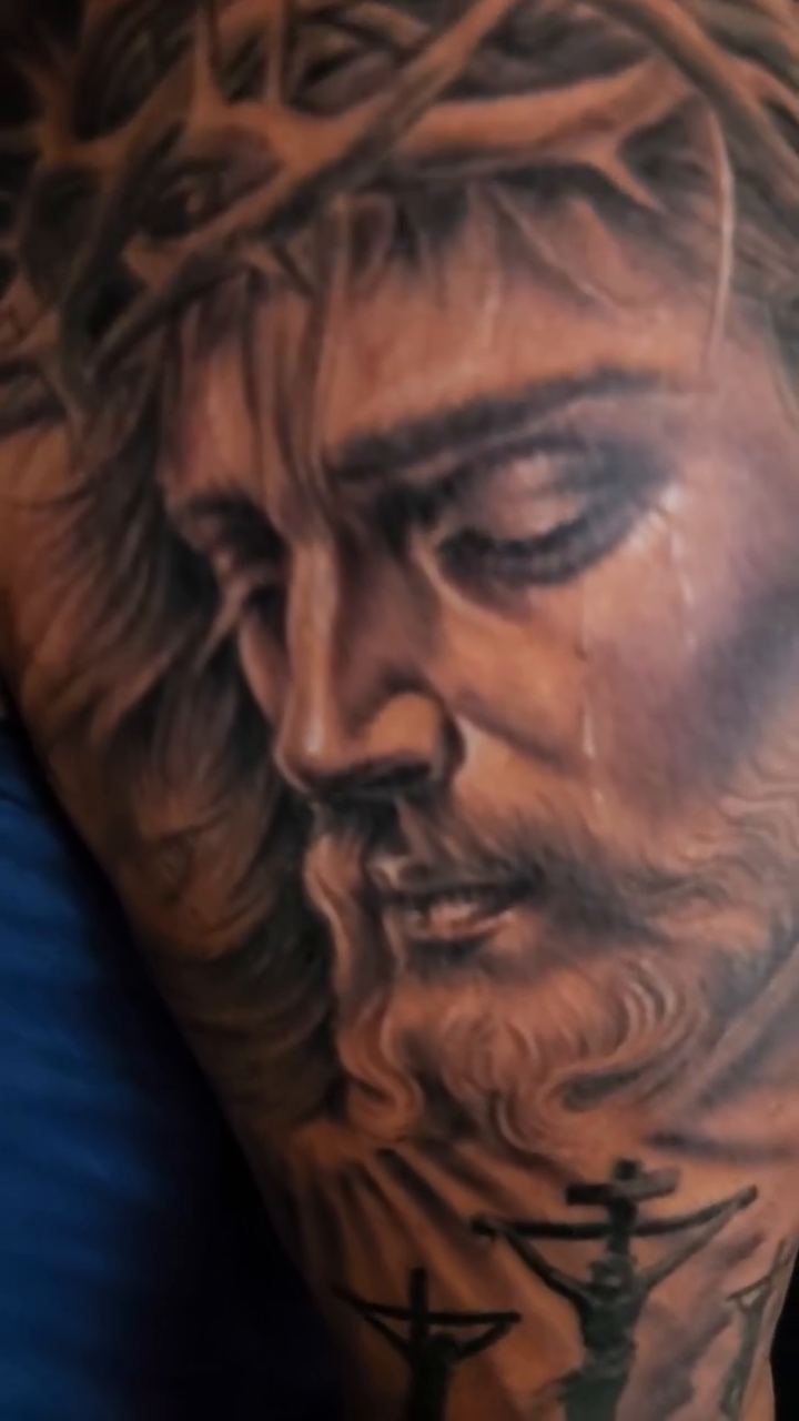 Jesus Christ on the cross realism tattoo by Aguascali Firme