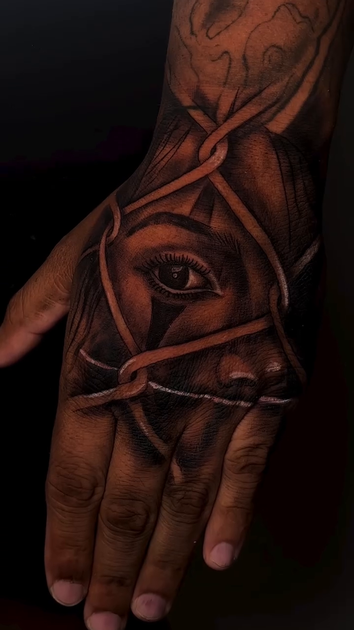 Face and eye within abstract lines realism tattoo by Thomas