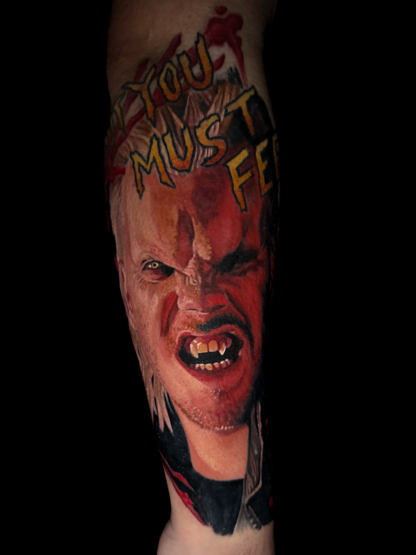 Angry man realism tattoo on the forearm by Dave James