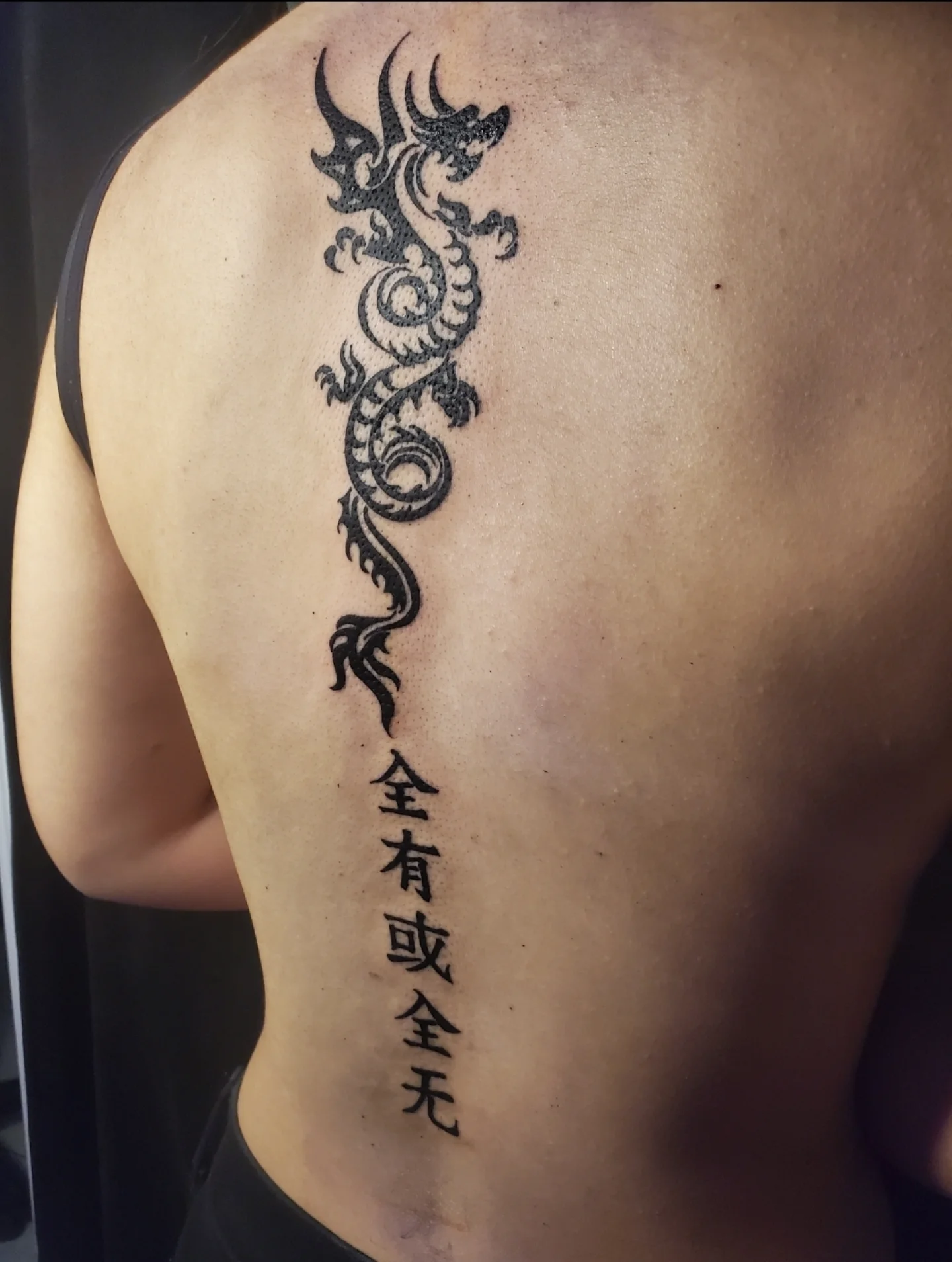 Dragon tribal tattoo by Joc