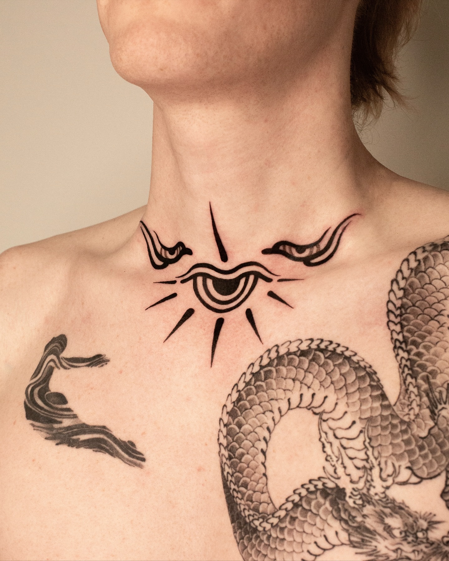 Eye and dragon black and grey tattoo on the chest by Fisher Man
