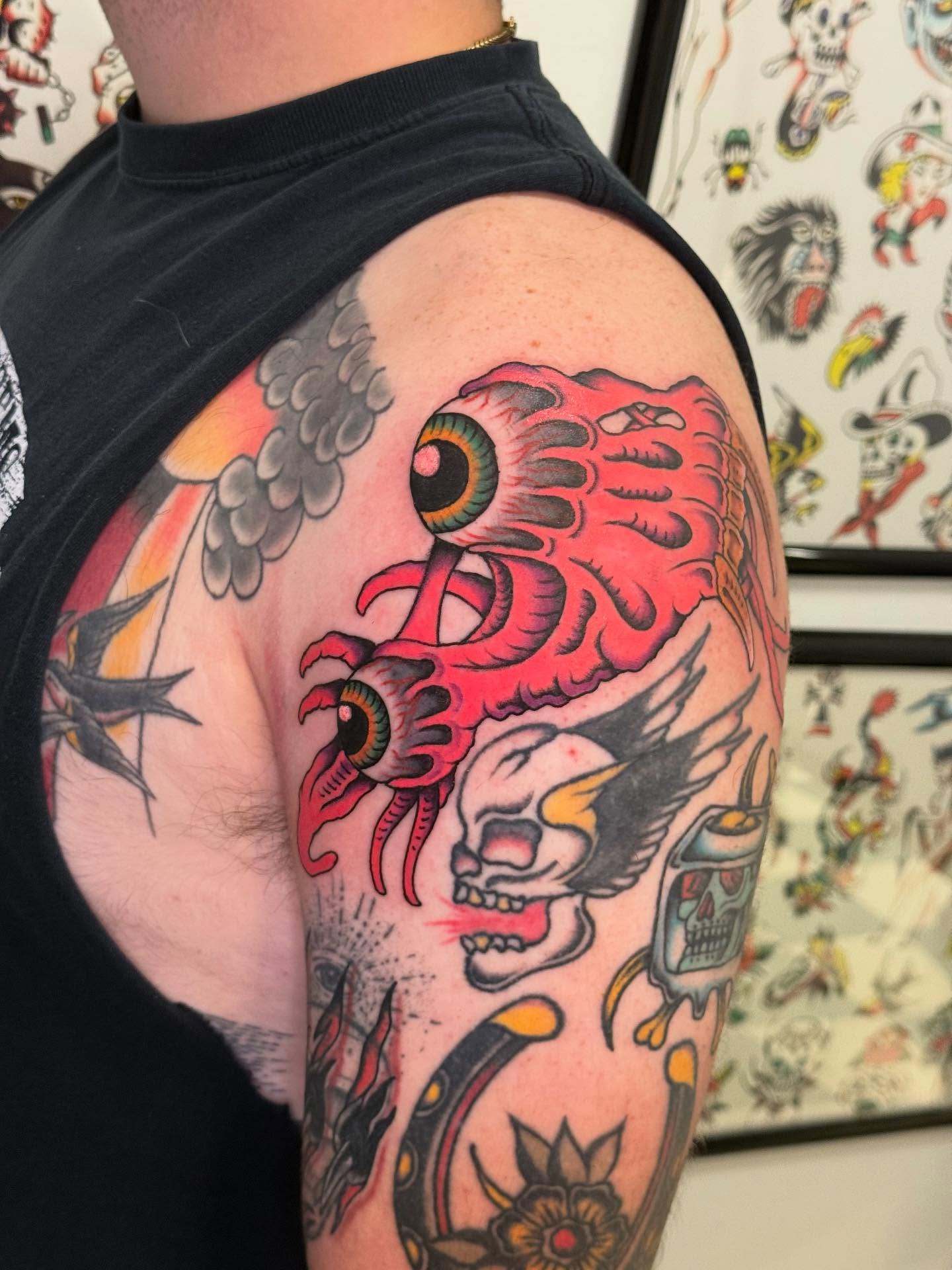 Japanese dragon American traditional tattoo on the upper arm by Cody Petkus