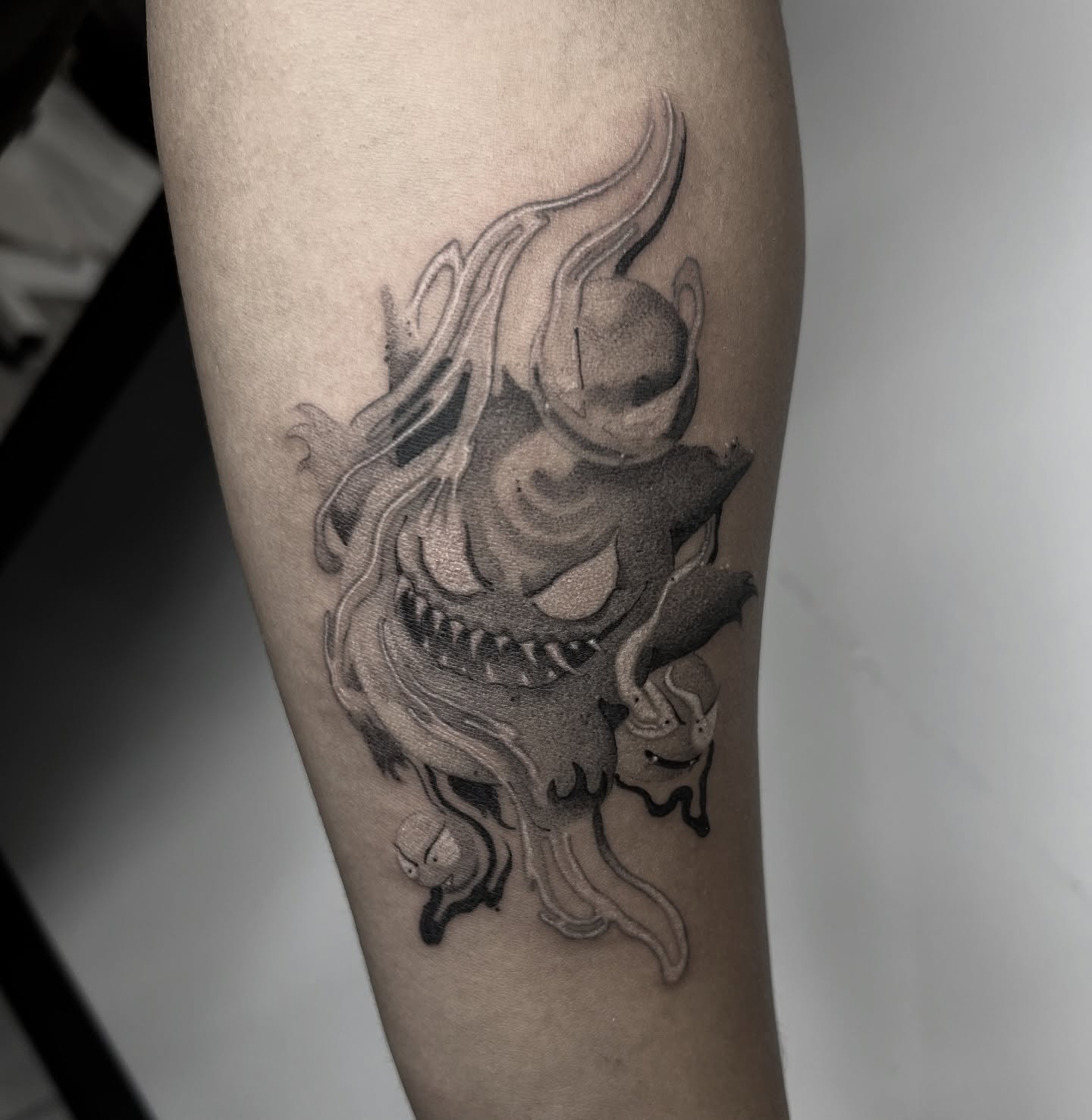 Demon dotwork tattoo on the forearm by Joshua Hung, Alhambra, California