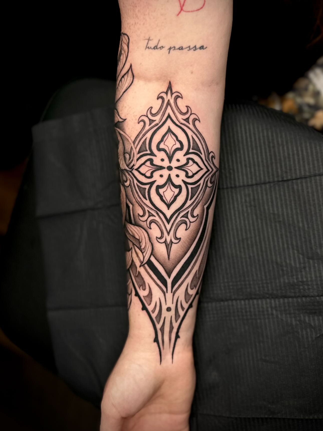 Geometric ornament tribal tattoo on the forearm by Madison Orchard Tattoos