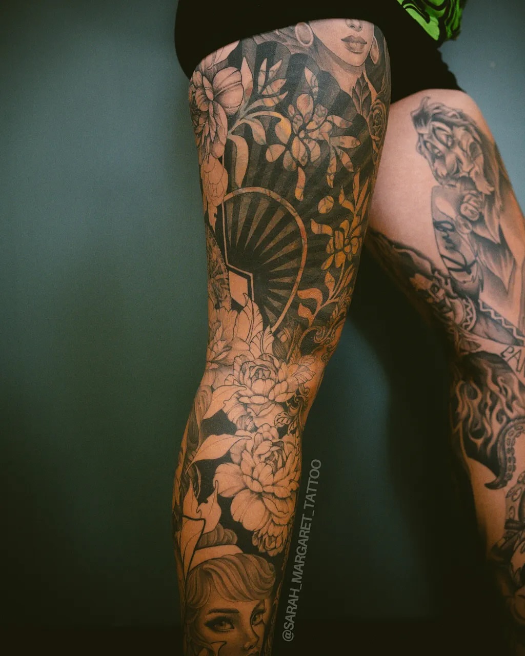 Floral bouquet American traditional tattoo on the forearm by Sarah Margaret
