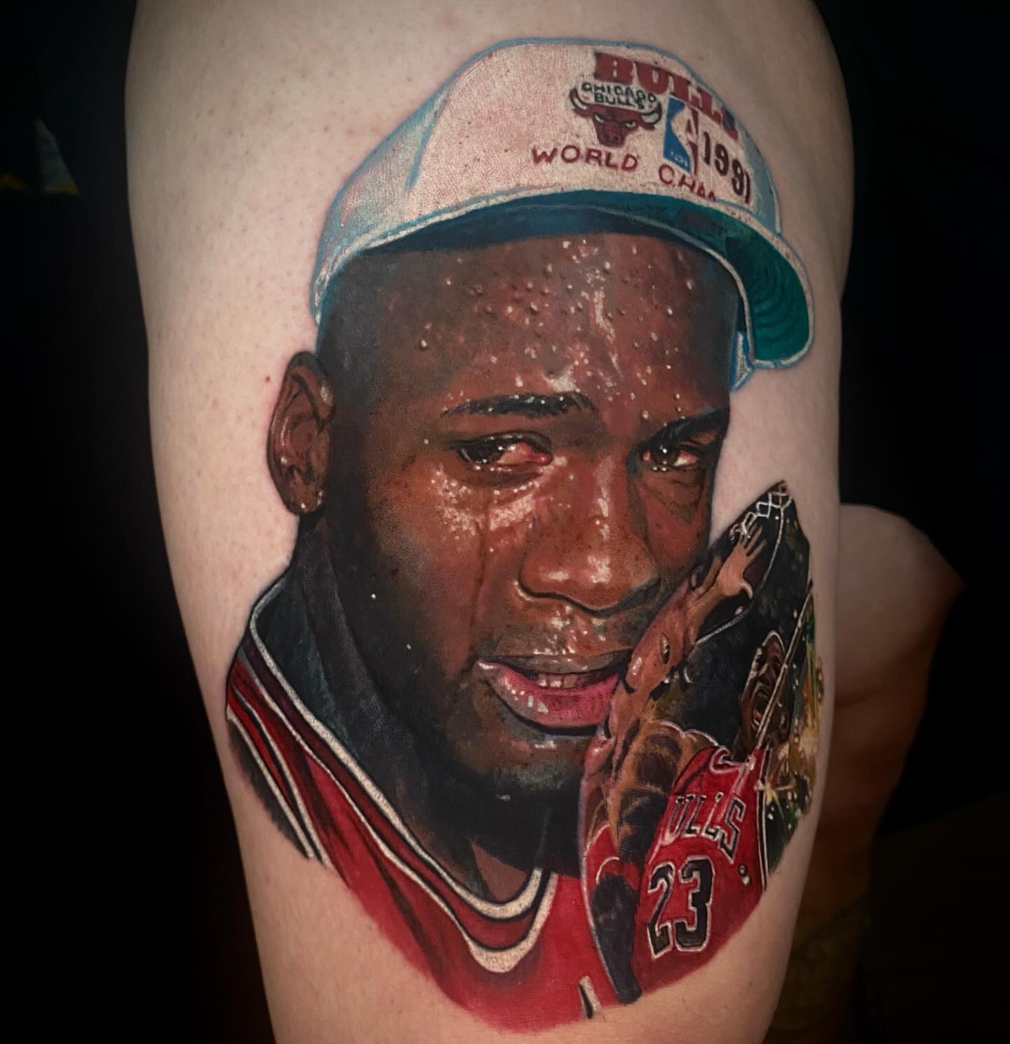 Jordan realism tattoo on the thigh by Carlos Rojas