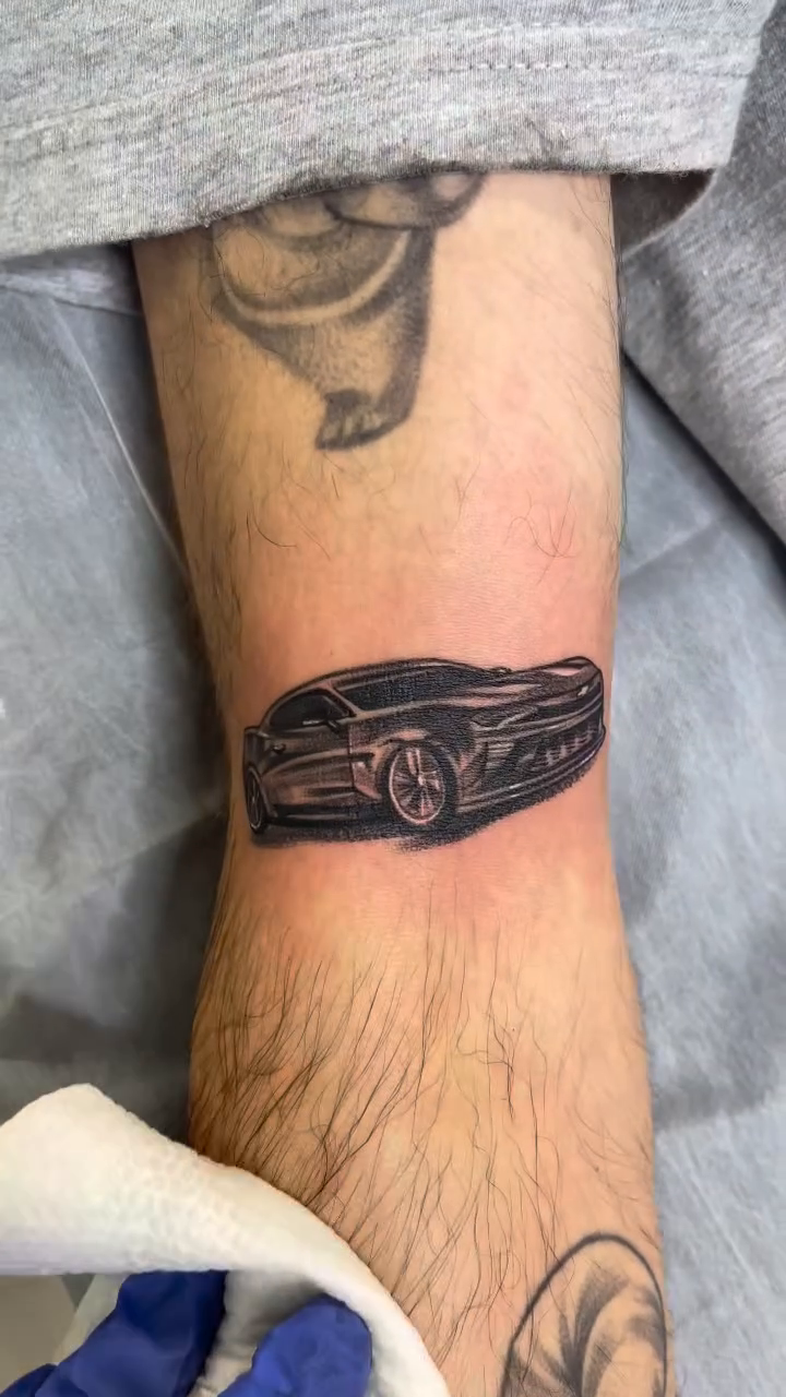 Classic car realism tattoo by Carla V