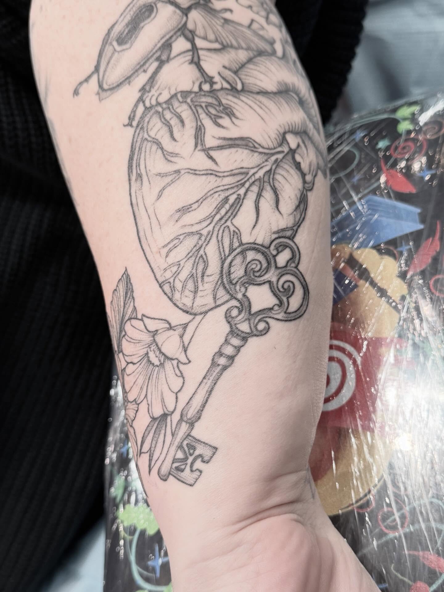 Key and heart realism tattoo on the forearm by Kirsten Marsden Ballantyne