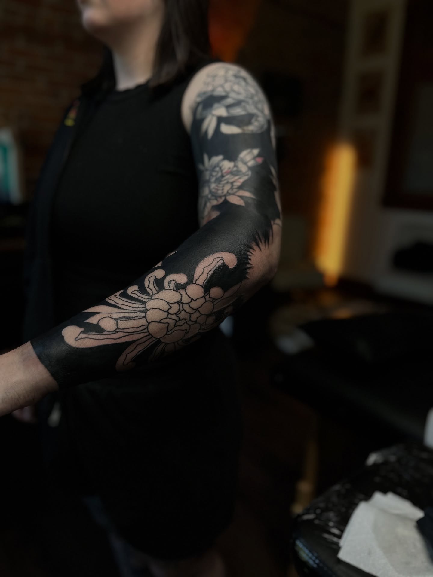 Floral bouquet black and grey tattoo on the forearm by แดแด ๐ฎ๐ท ๐ฆ๐ซ