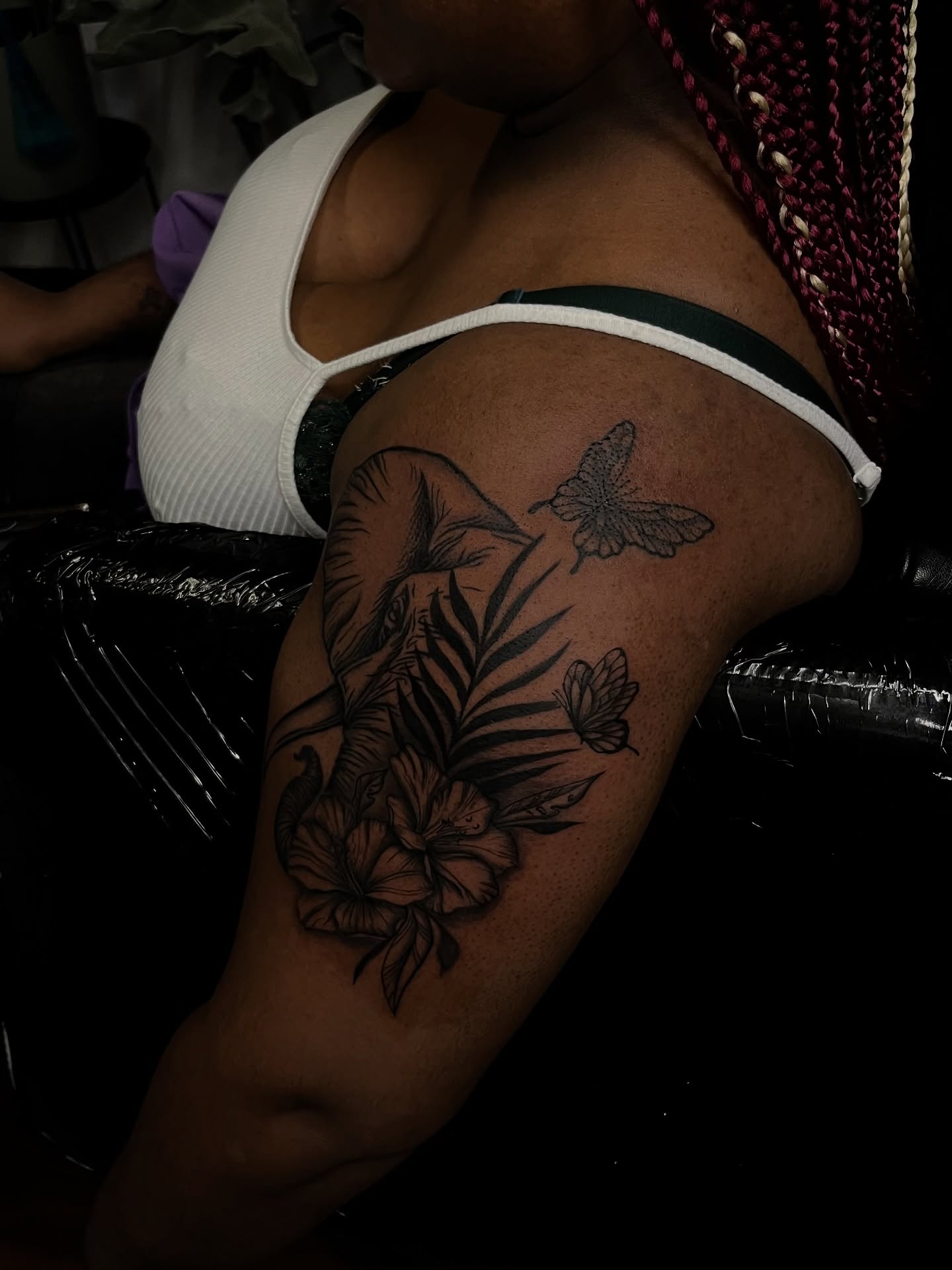Floral arrangement black and grey tattoo on the shoulder by Unknwn Ink ⭐️