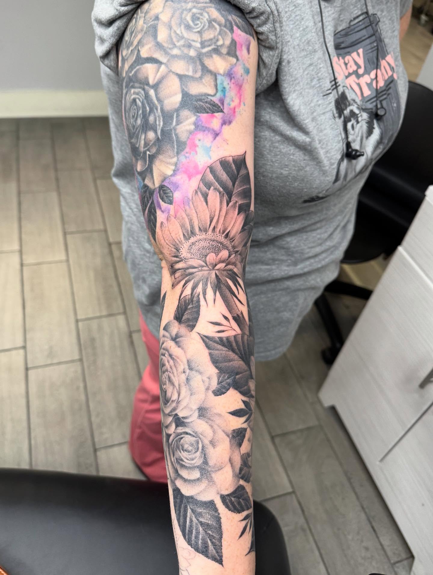 Floral bouquet dotwork tattoo on the forearm by Joey Flaherty