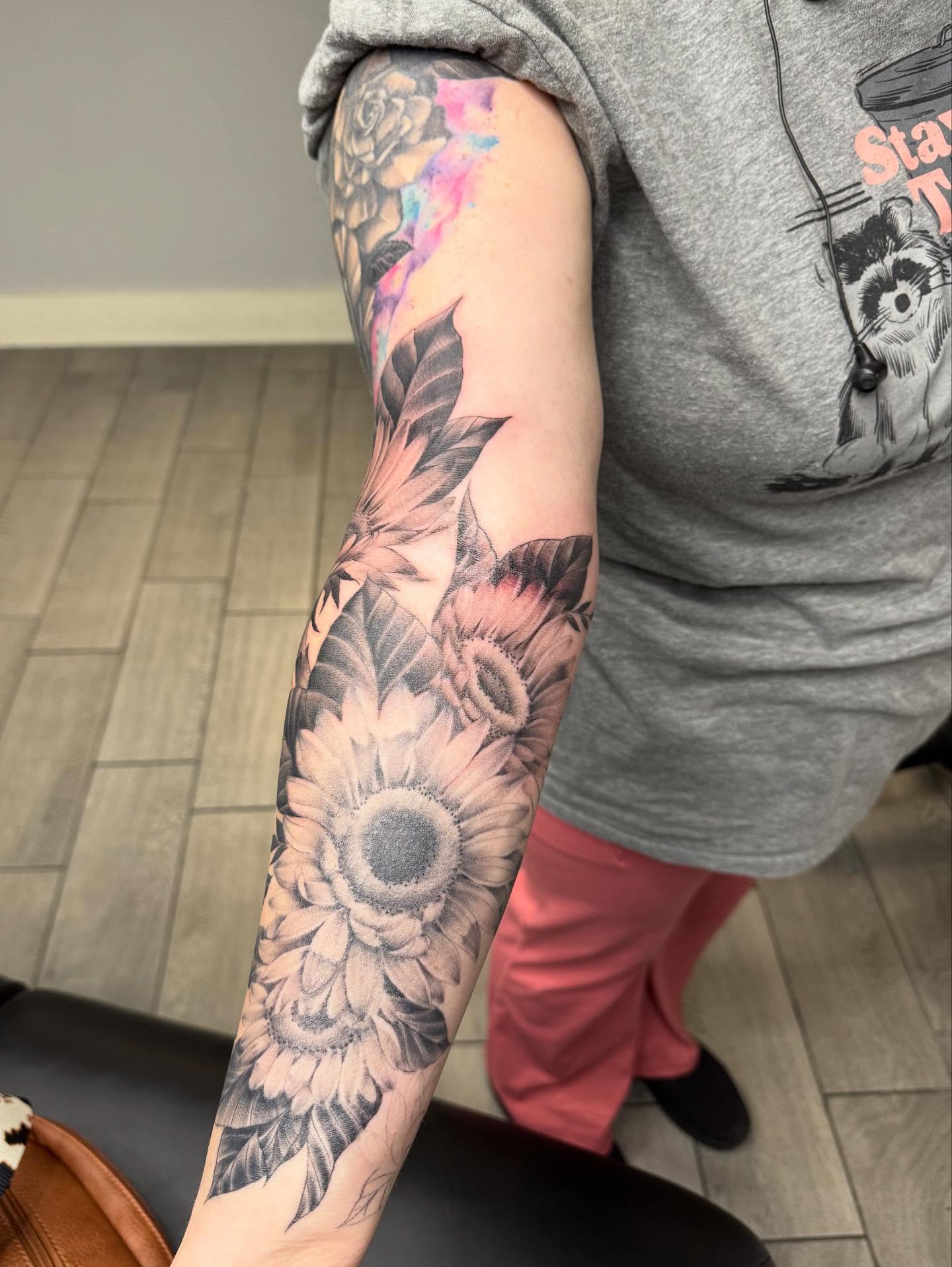 Sunflower realism tattoo on the forearm by Joey Flaherty