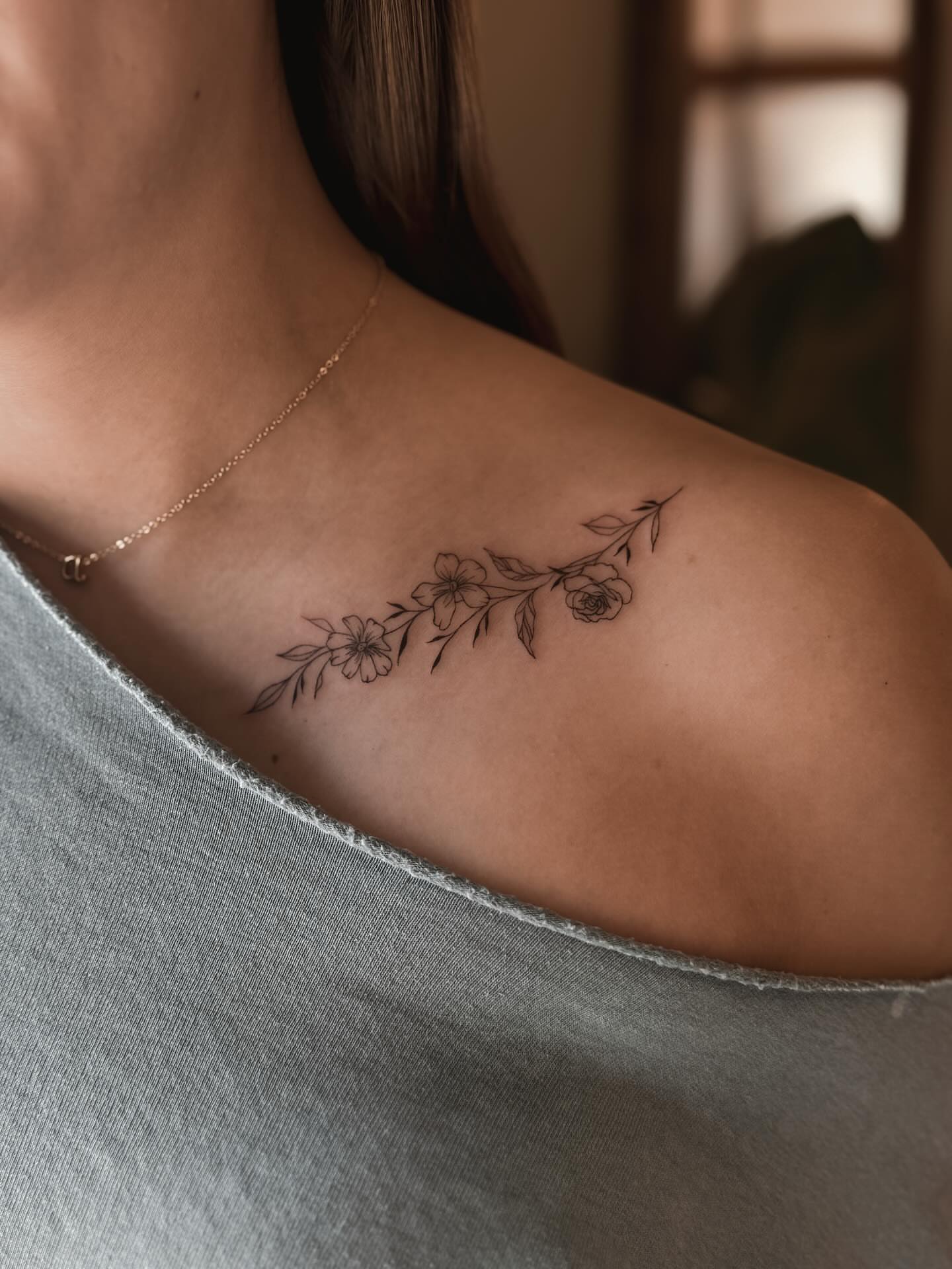 Floral branch fine line tattoo on the shoulder by π»ππ π
ππππ Tattoo Artist, Las Vegas, Nevada