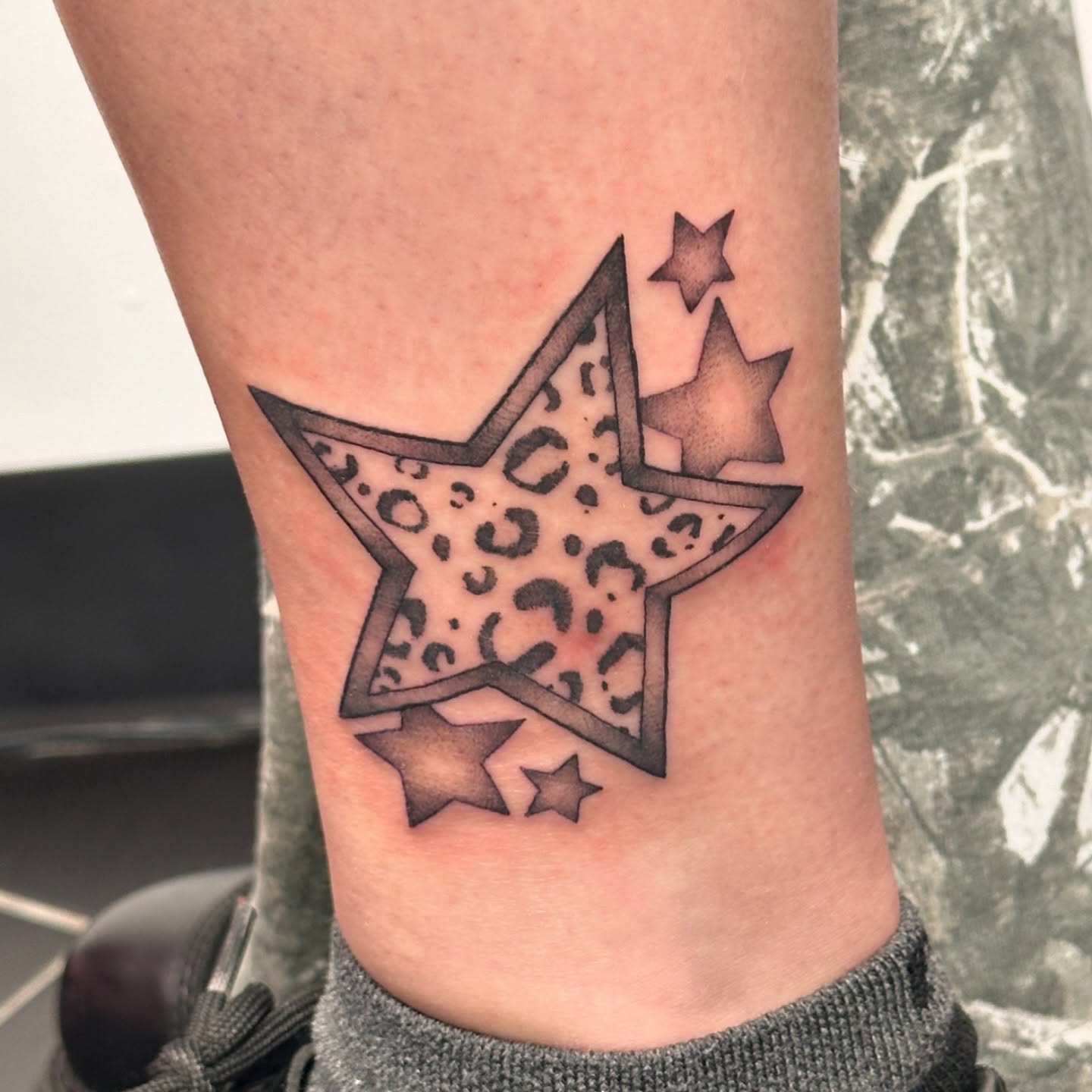 Star geometric tattoo on the forearm by TATTOOLIZARD (James)