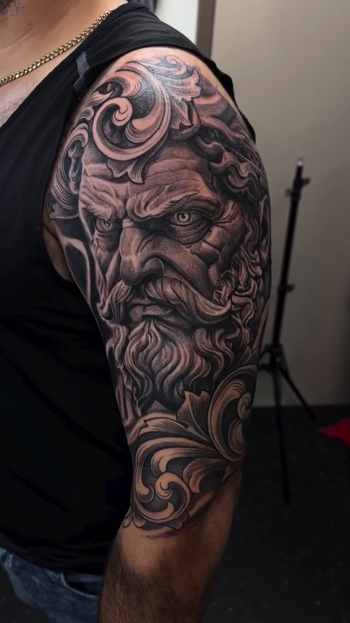 Tattoo by @tovar_tattoos — realism, black_and_grey