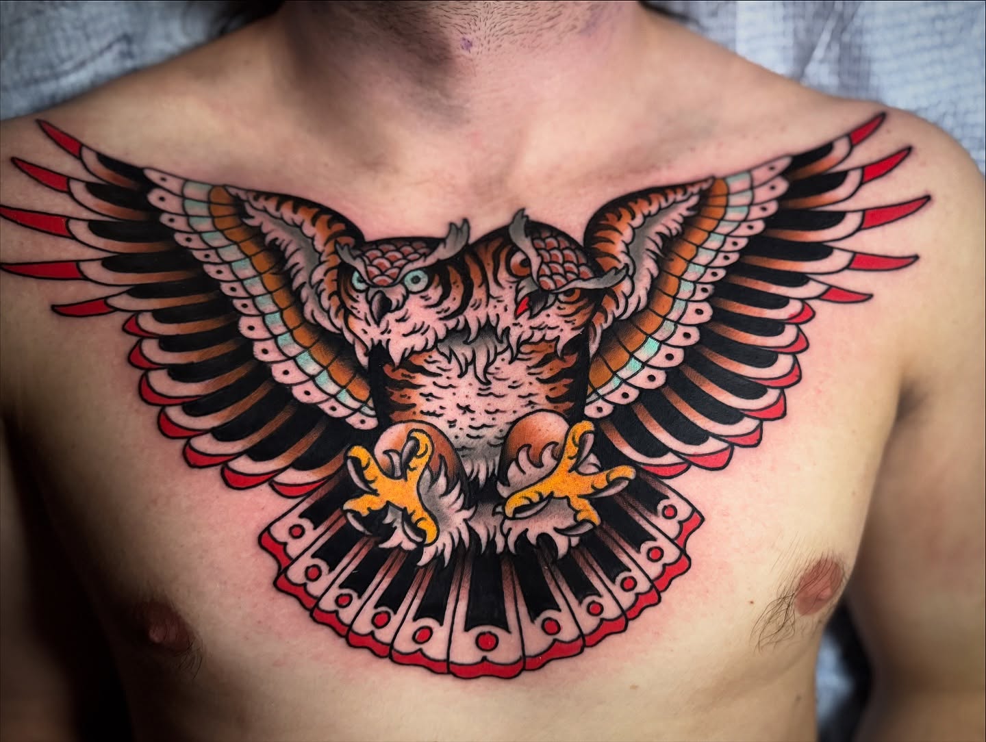 Owl American traditional tattoo on the chest by K y l e   M a c K e n z i e, Salem, Massachusetts