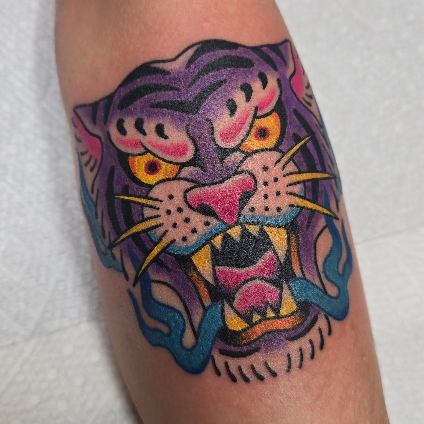 Tiger American traditional tattoo on the forearm by A. Teixeira, Los Angeles, California