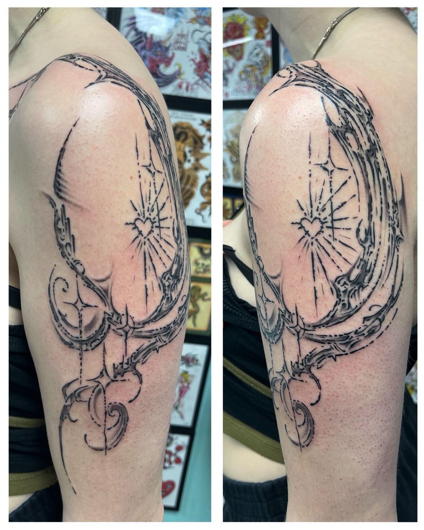 Heart with radiating lines black and grey tattoo on the shoulder by Brian Mcfadden