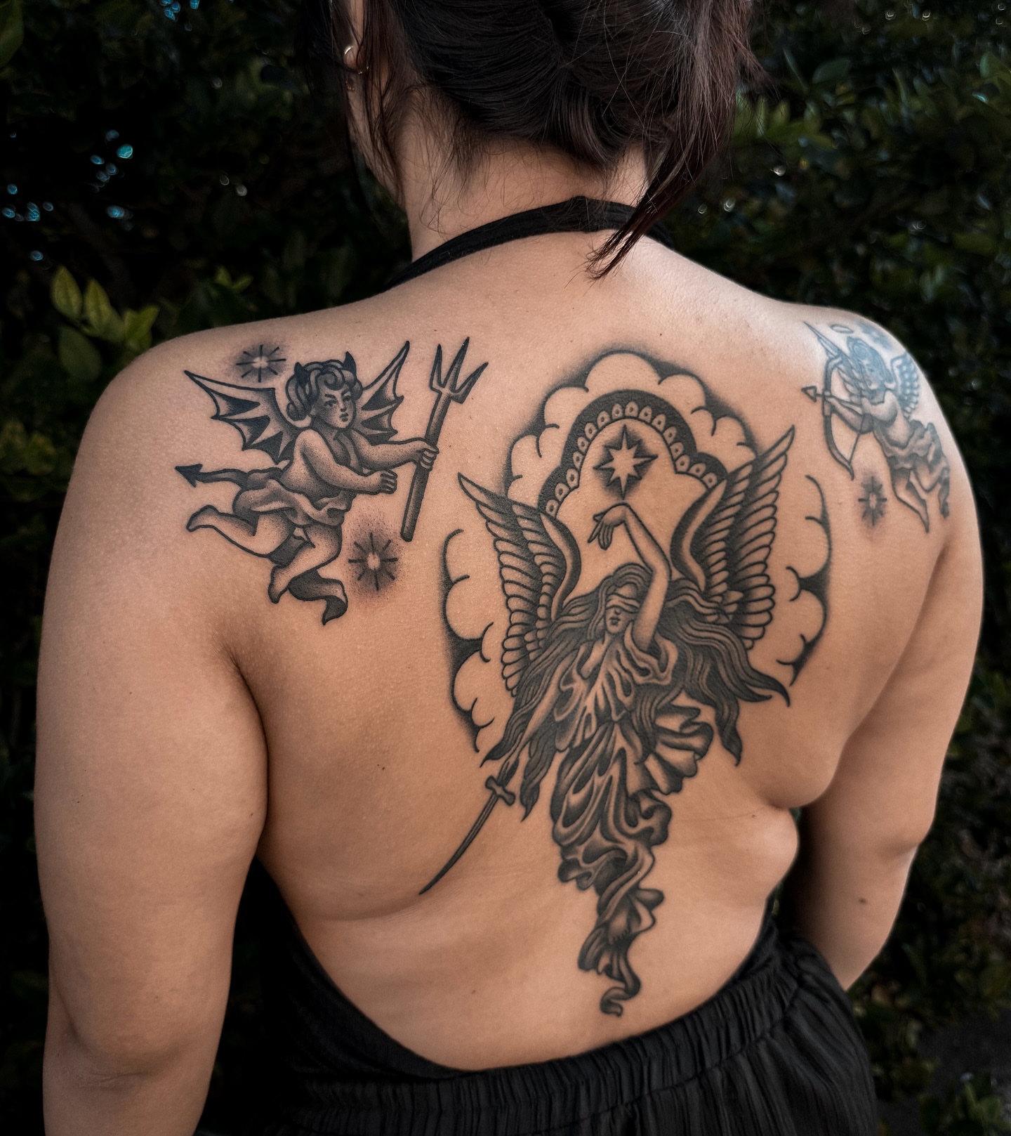 Angel and devil black and grey tattoo on the back by Peach