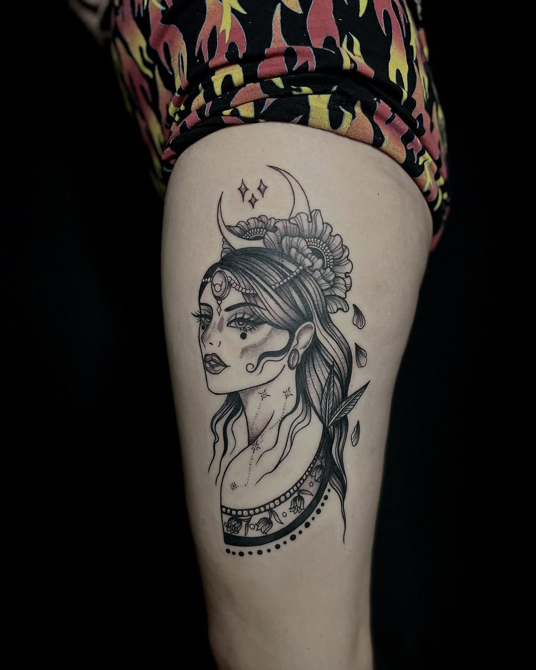 Woman with crescent moon and flowers neo-traditional tattoo on the thigh by Sasha “Sashimi” Shabasov