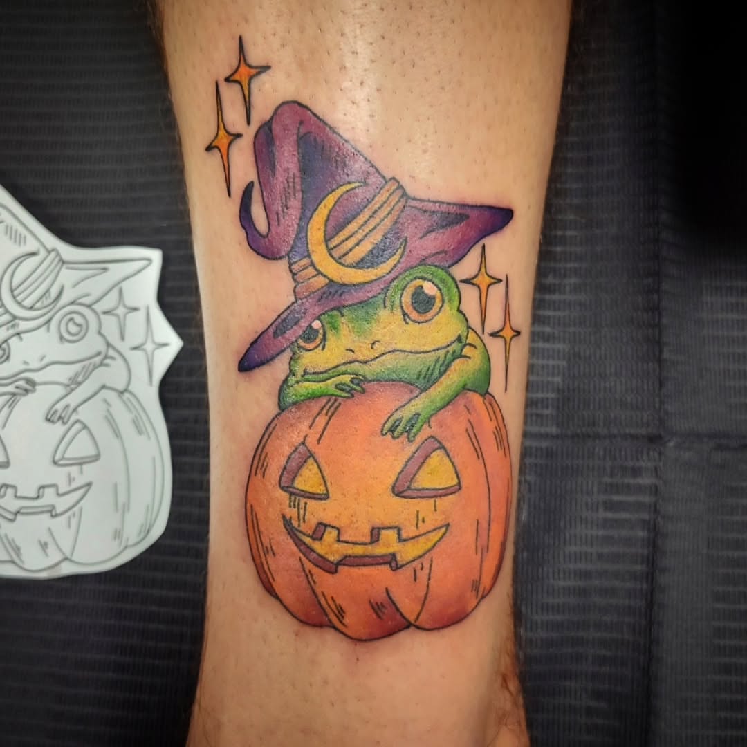 Frog on pumpkin new school tattoo on the forearm by Julie MacDonald