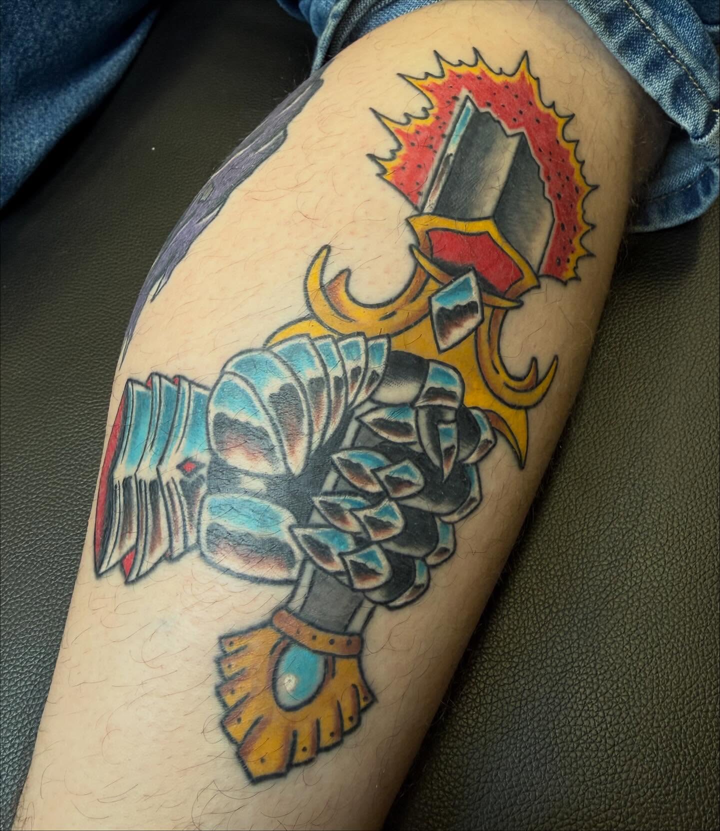 Warrior helmet American traditional tattoo on the thigh by Brendan Willbern, Austin, Texas