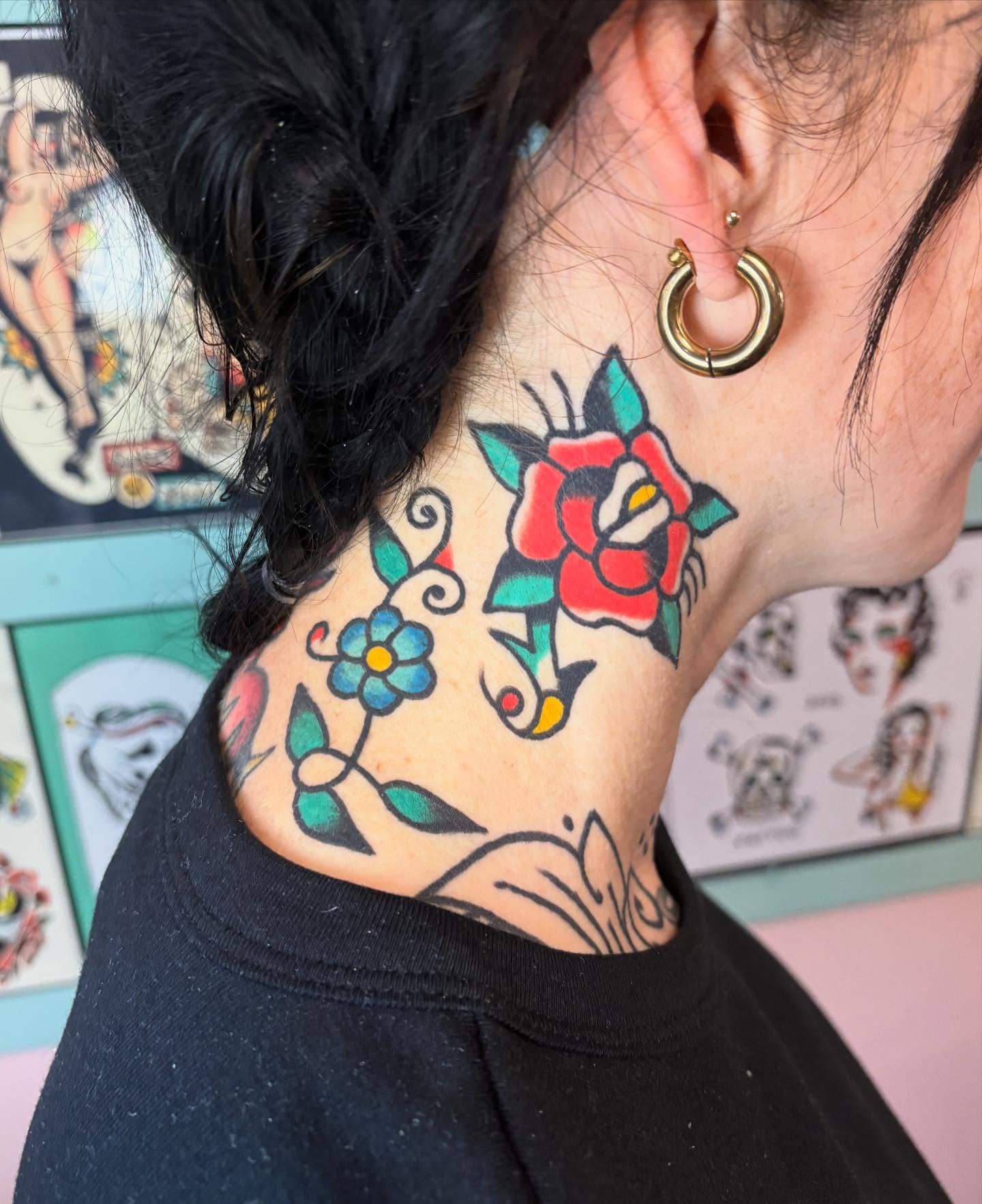 Floral American traditional tattoo on the neck by Traditional Tattooing