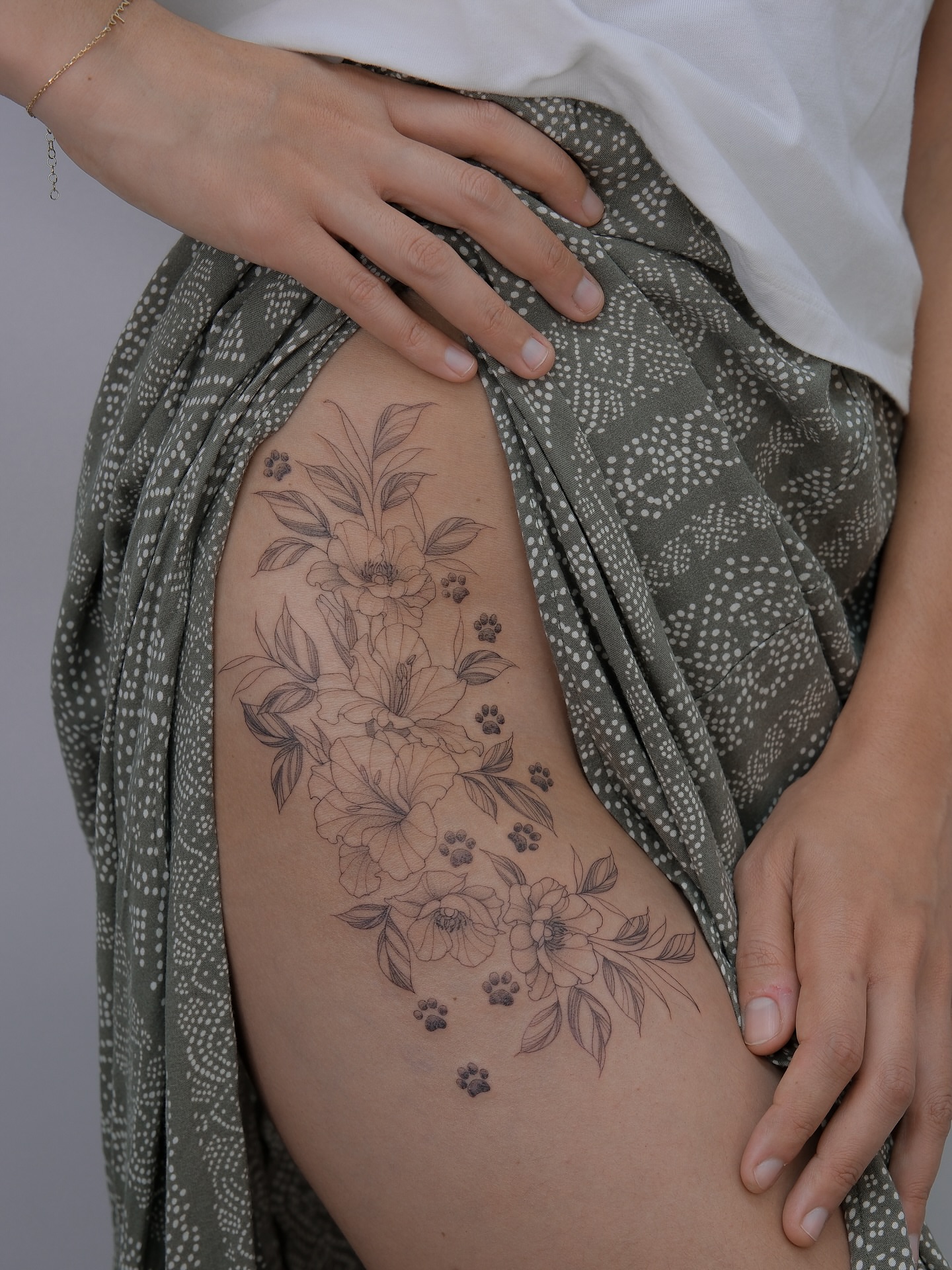 Floral bouquet black and grey tattoo on the thigh by Tattoo in Charlotte NC, Charlotte, North Carolina