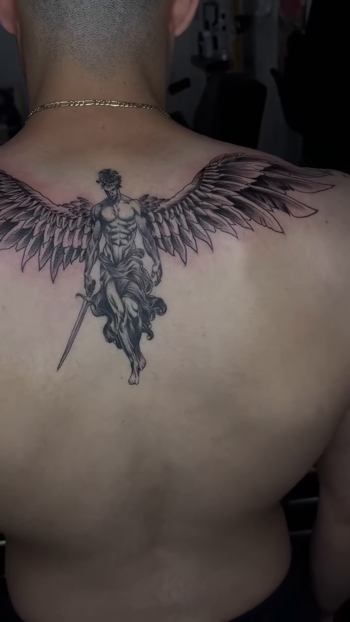 Angel with sword realism tattoo by Kevin