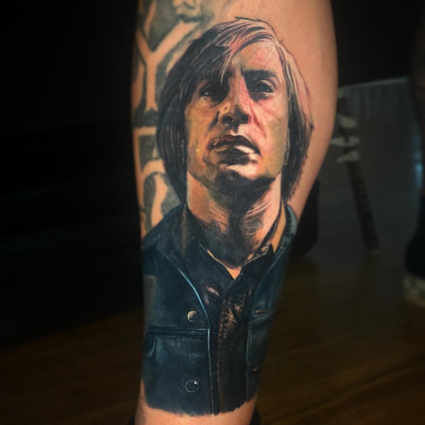 Portrait realism tattoo on the forearm by Carlos Rojas
