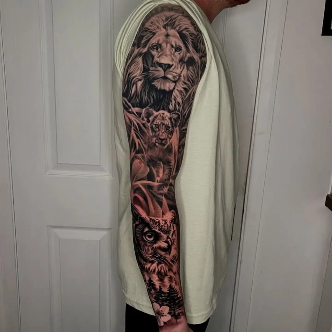 Lion and cub realism tattoo on the forearm by ink.alchemist