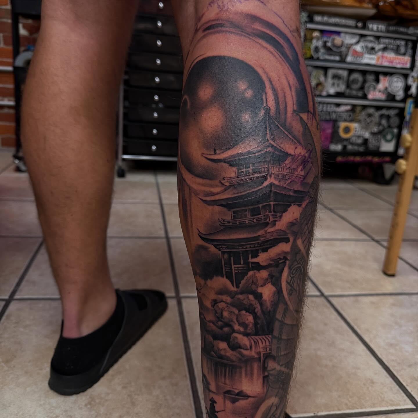 Japanese pagoda realism tattoo on the calf by T, Saugus, Massachusetts