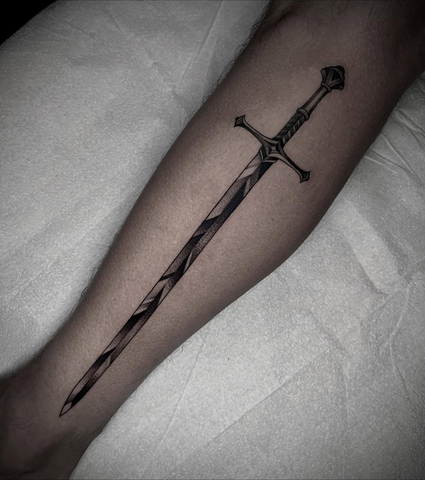 Sword black and grey tattoo on the forearm by Martha Gual π€ East ATX Tattooer