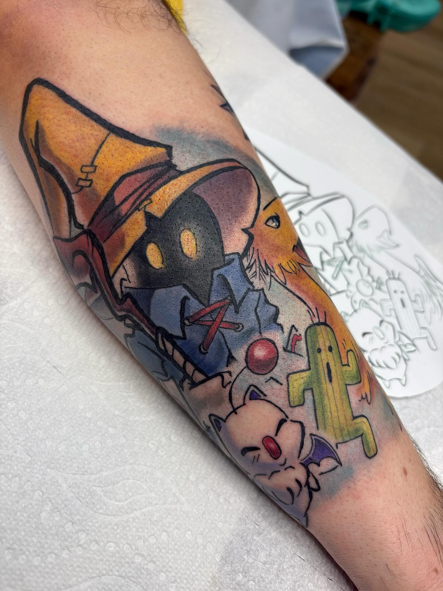 Anime characters anime tattoo on the forearm by Gabby