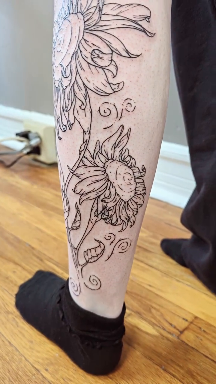 Sunflowers and hands sketch tattoo on the leg by Patricio