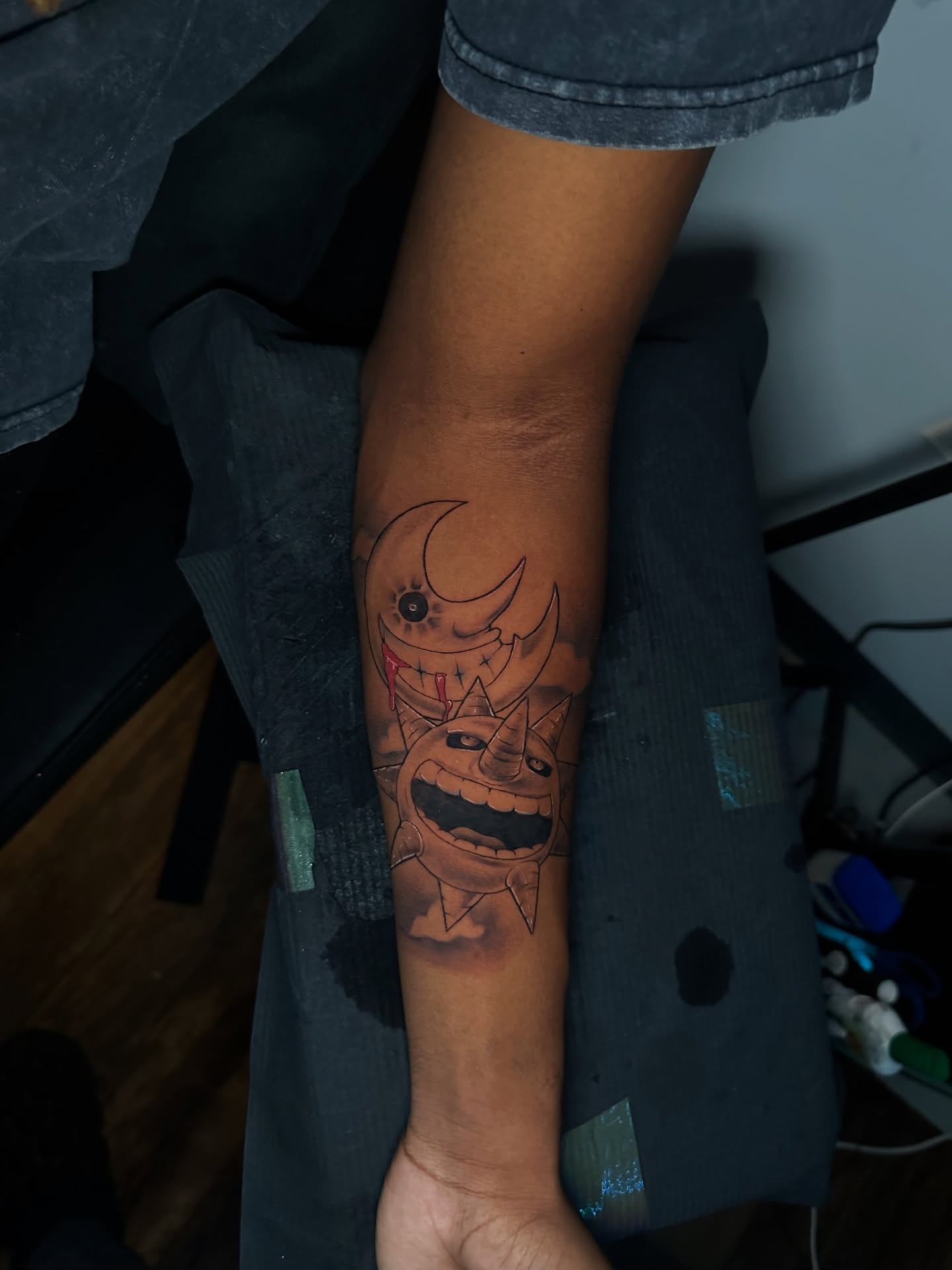 Sun and moon American traditional tattoo on the forearm by Chris (Pikasso)