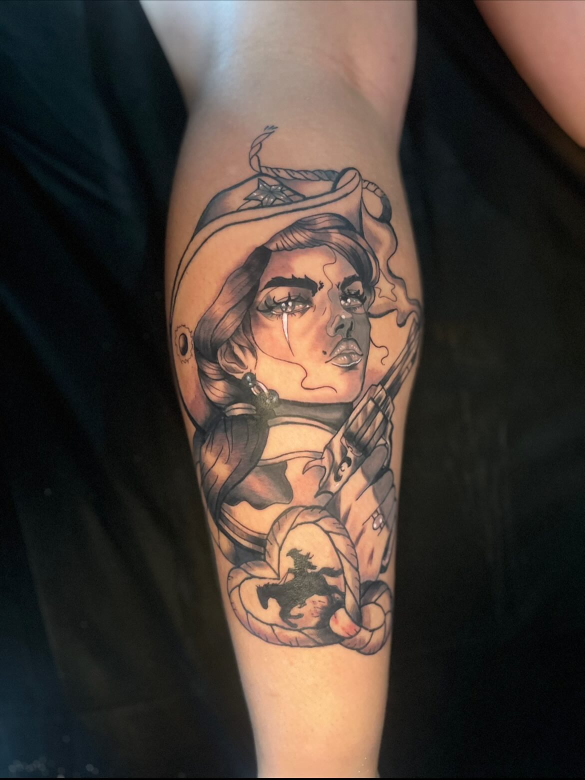 Woman with cowboy hat American traditional tattoo on the forearm by Deville Pinson