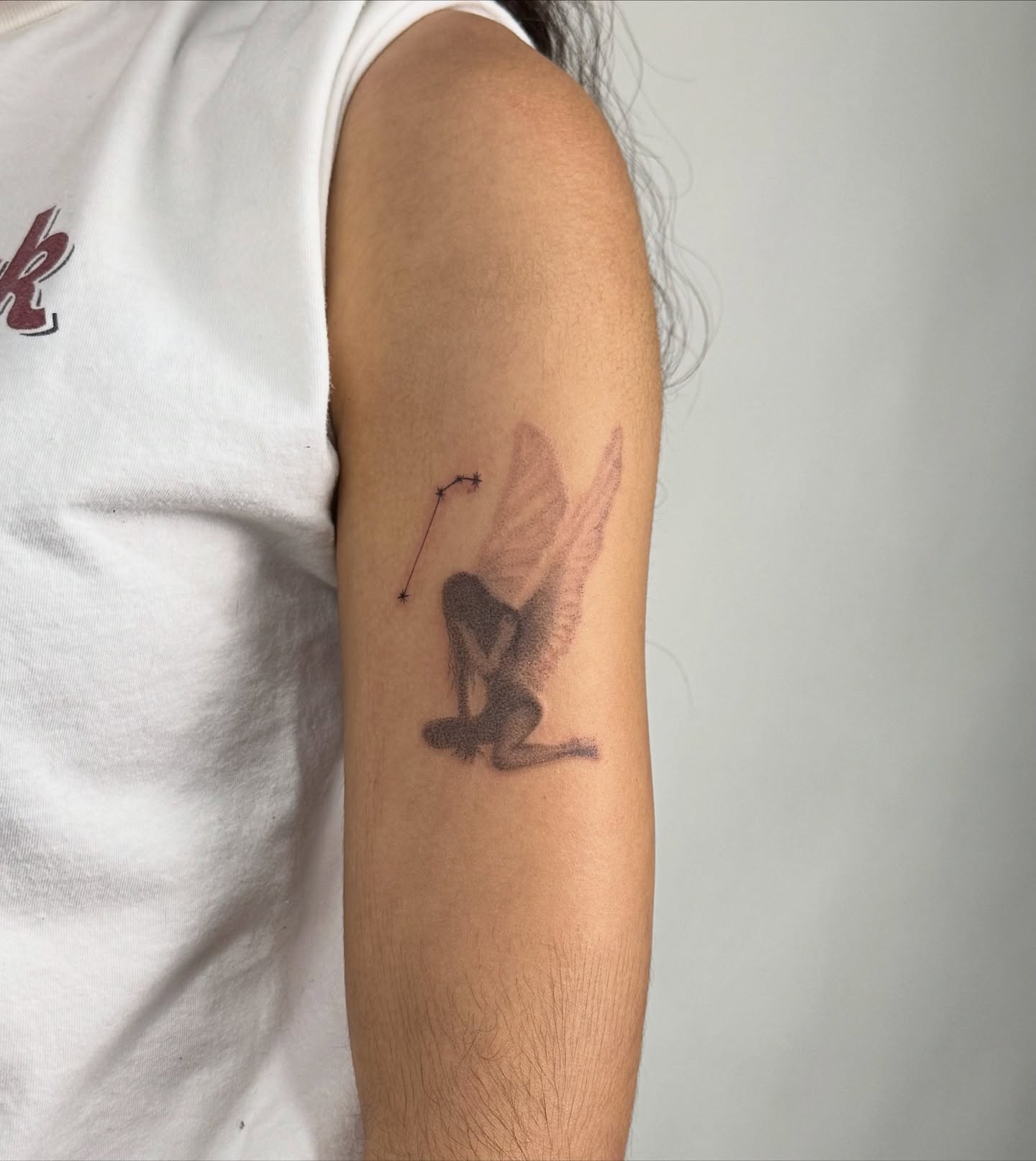 Fairy black and grey tattoo on the forearm by sabina