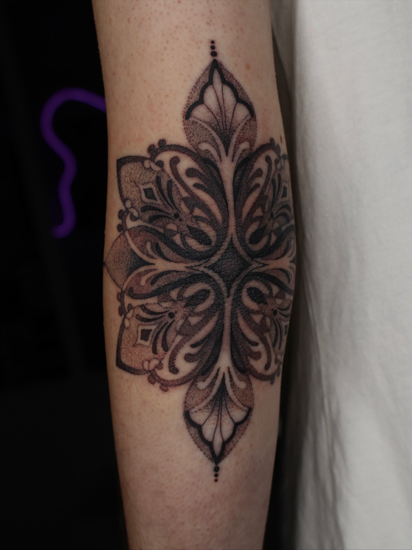 Floral pattern dotwork tattoo on the forearm by Jessica Roberts