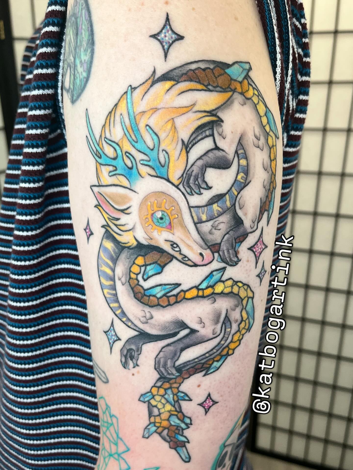 Dragon new school tattoo on the forearm by Kat (Scout) Bogart