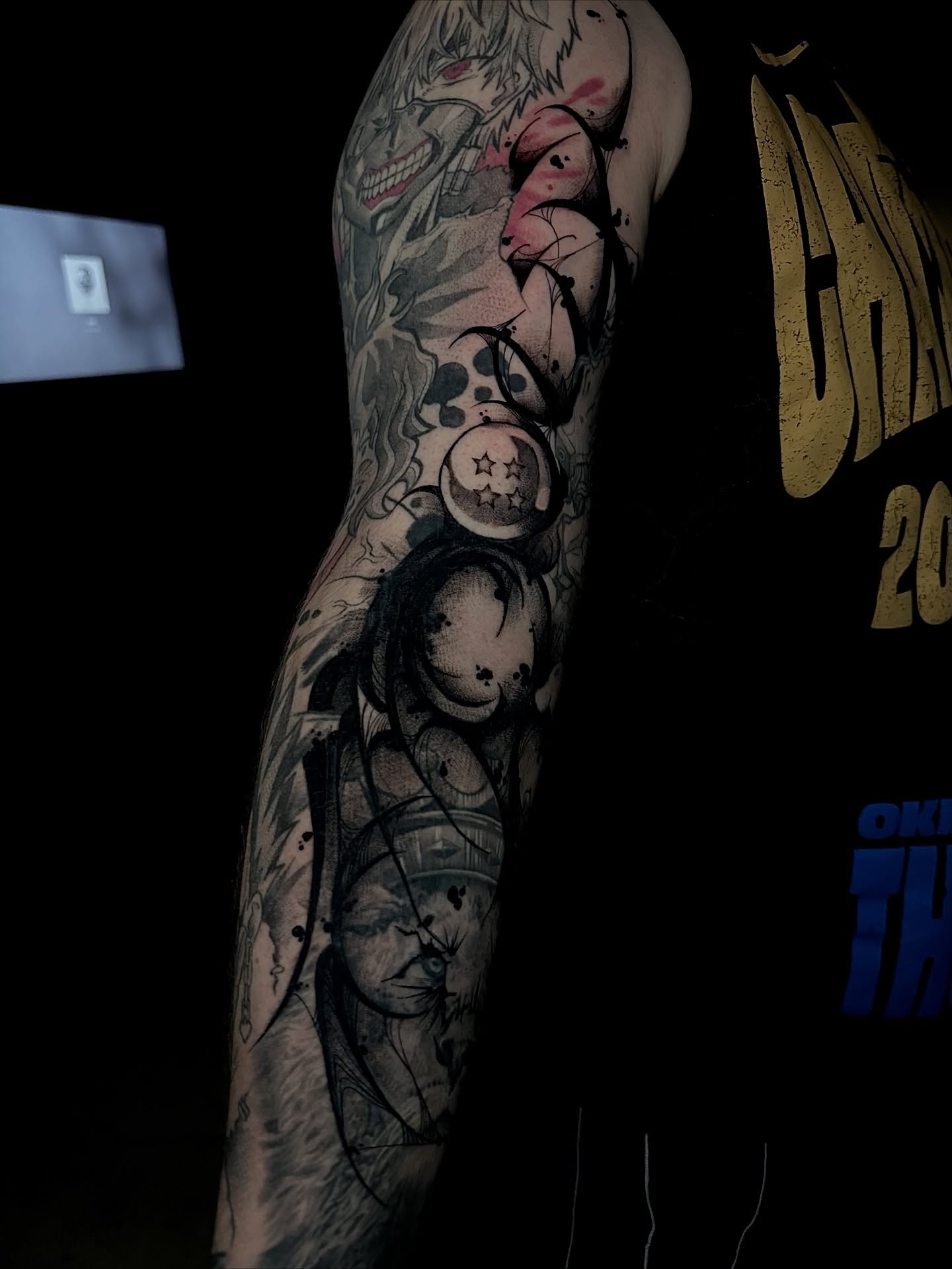 Anime character anime tattoo on the upper arm by Crystal, Las Vegas, Nevada