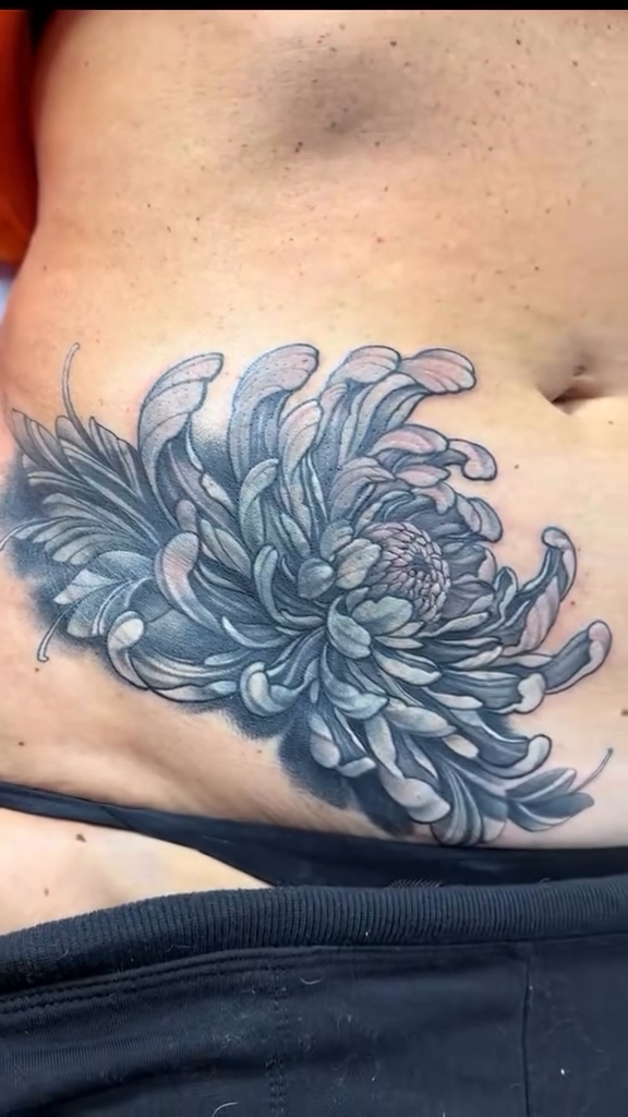 Chrysanthemum flower japanese irezumi tattoo by Dani B.