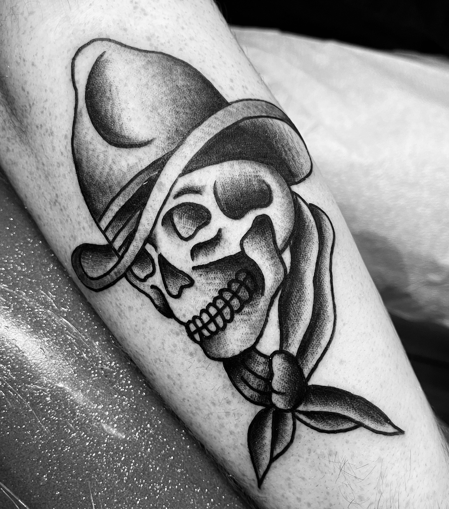 Skull wearing hat American traditional tattoo on the forearm by adamsayre, San Diego, California