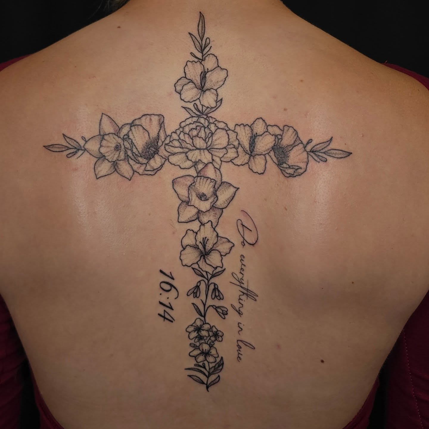 Cross with flowers black and grey tattoo on the back by Linda Marroum, Morningside, Maryland